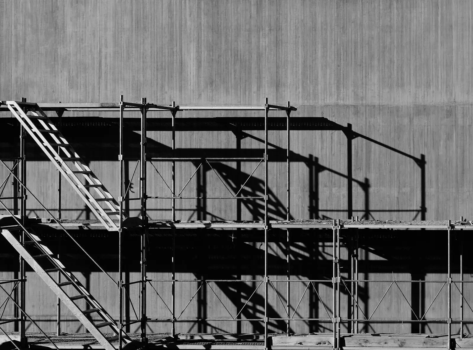 Scaffolding with stair towers, in black and white